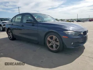 2015 BMW 3 Series 320i with VIN WBA3B1C58FK140327, listed as a Copart auction lot 57999675 with 124,437 mi miles and Salvage title. Bid and sale history available at DreamBid. Image 4.