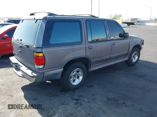1996 Ford Explorer XL with VIN 1FMDU34X5TZB86872, listed as a IAAI auction lot 42573906 with 118,304 mi miles and . Bid and sale history available at DreamBid. Image 4.