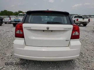 2009 Dodge Caliber SXT z VIN 1B3HB48A89D198108, wystawiony jako Copart lot #58910415 z przebiegiem 176 257 mil mil oraz Czysty tytuł • Clean title. Historia ofert i sprzedaży dostępna na DreamBid. Obrazek 6.