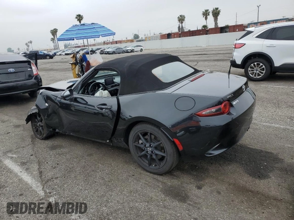 2021 Mazda MX-5 Miata Sport with VIN JM1NDAB70M0455950, listed as a Copart auction lot 54979915 with Not provided miles and Salvage title. Bid and sale history available at DreamBid. Image 2.