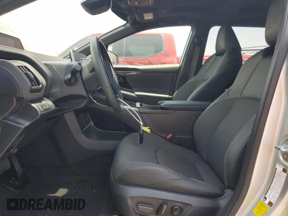 2024 Toyota bZ4X XLE with VIN JTMAAAAA1RA044367, listed as a Copart auction lot 59583075 with 10,890 mi miles and Salvage title. Bid and sale history available at DreamBid. Image 7.