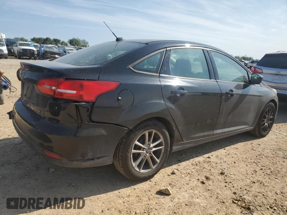2018 Ford Focus SE with VIN 1FADP3F2XJL262394, listed as a Copart auction lot 53642095 with 138,903 mi miles and Salvage title. Bid and sale history available at DreamBid. Image 3.