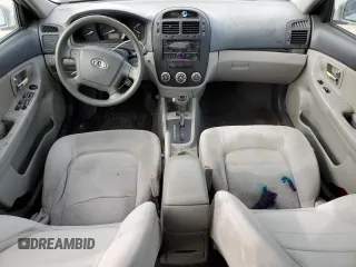 2009 Kia Spectra EX z VIN KNAFE222695665181, wystawiony jako Copart lot #42852235 z przebiegiem 234 852 mil mil oraz Szkody całkowita. Historia ofert i sprzedaży dostępna na DreamBid. Obrazek 8.