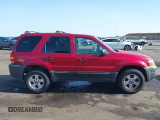 2006 Ford Escape XLT with VIN 1FMYU03106KB20126, listed as a IAAI auction lot 42565637 with 188,564 mi miles and . Bid and sale history available at DreamBid. Image 13.