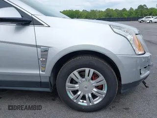 2011 Cadillac SRX Luxury Collection with VIN 3GYFNAEY5BS563048, listed as a IAAI auction lot 42031973 with 182,047 mi miles and . Bid and sale history available at DreamBid. Image 12.