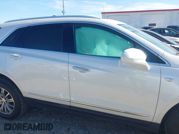 2017 Cadillac XT5 Luxury FWD with VIN 1GYKNBRS1HZ304062, listed as a IAAI auction lot 42460981 with 77,310 mi miles and . Bid and sale history available at DreamBid. Image 13.