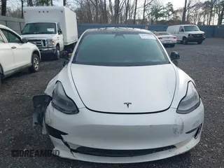 2021 Tesla Model 3 Long Range with VIN 5YJ3E1EB8MF974007, listed as a IAAI auction lot 41915513 with 107,354 mi miles and . Bid and sale history available at carsss.com. Image 12.