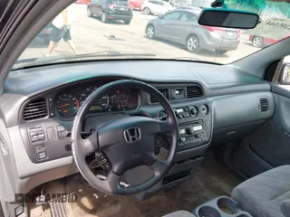 2004 Honda Odyssey EX-RES z VIN 5FNRL18824B138287, wystawiony jako IAAI lot #42245444 z przebiegiem 196 932 mil mil oraz . Historia ofert i sprzedaży dostępna na DreamBid. Obrazek 14.