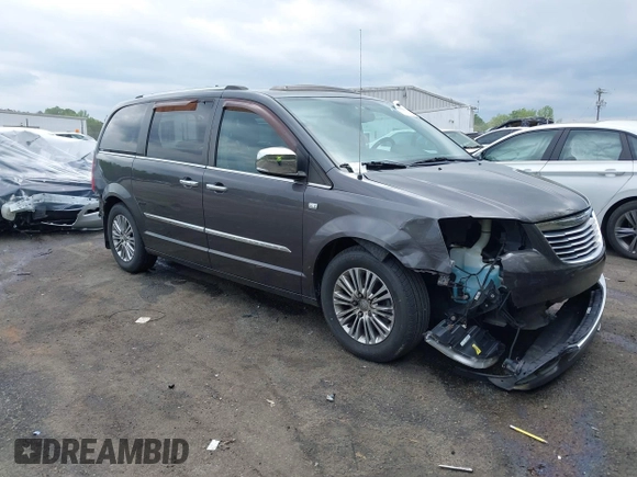 2014 Chrysler Town & Country Touring L with VIN 2C4RC1CG6ER195502, listed as a IAAI auction lot 42009629 with 126,157 mi miles and . Bid and sale history available at DreamBid. Image 1.