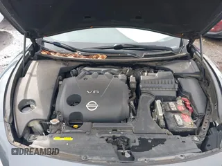 2013 Nissan Maxima SV z VIN 1N4AA5AP7DC814845, wystawiony jako IAAI lot #41758456 z przebiegiem 139 556 mil mil oraz . Historia ofert i sprzedaży dostępna na DreamBid. Obrazek 10.
