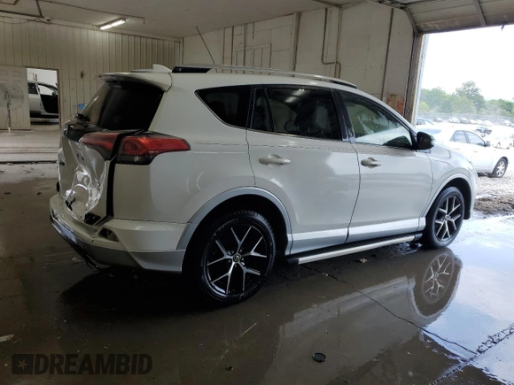 2016 Toyota RAV4 SE with VIN JTMJFREV0GD190302, listed as a Copart auction lot 59330345 with 102,069 mi miles and Salvage title. Bid and sale history available at DreamBid. Image 3.
