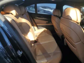 2012 BMW 7 Series 750i z VIN WBAKA8C52CCY37618, wystawiony jako Copart lot #87510215 z przebiegiem 113 512 mil mil oraz Czysty tytuł • Clean title. Historia ofert i sprzedaży dostępna na DreamBid. Obrazek 10.