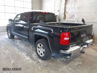 2015 GMC Sierra 1500 SLT with VIN 3GTU2VEC4FG251264, listed as a IAAI auction lot 40883499 with 207,004 mi miles. Bid and sale history available at carsss.com. Image 3.
