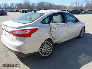 2012 Ford Focus SEL with VIN 1FAHP3H23CL183151, listed as a IAAI auction lot 41800487 with 165,370 mi miles. Bid and sale history available at carsss.com. Image 4.