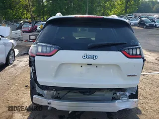 2019 Jeep Cherokee Latitude Plus z VIN 1C4PJLLBXKD308346, wystawiony jako IAAI lot #42146125 z przebiegiem 94 066 mil mil oraz . Historia ofert i sprzedaży dostępna na DreamBid. Obrazek 6.