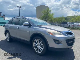 2012 Mazda CX-9 Grand Touring z VIN JM3TB3DV0C0857849, wystawiony jako Copart lot #56733865 z przebiegiem 153 973 mil mil oraz Czysty tytuł • Clean title. Historia ofert i sprzedaży dostępna na DreamBid. Obrazek 1.