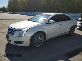2013 Cadillac XTS with VIN 2G61N5S34D9115032, listed as a Copart auction lot 75346904 with 103,451 mi miles and Salvage Title. Bid and sale history available at DreamBid. Image 1.