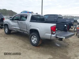 2018 Toyota Tacoma SR with VIN 3TMCZ5AN4JM130307, listed as a IAAI auction lot 41541477 with 74,369 mi miles and . Bid and sale history available at DreamBid. Image 3.