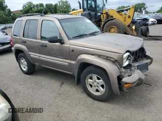 2002 Jeep Liberty Limited with VIN 1J4GL58K22W120496, listed as a Copart auction lot 62561875 with 161,388 mi miles and Salvage title. Bid and sale history available at DreamBid. Image 4.
