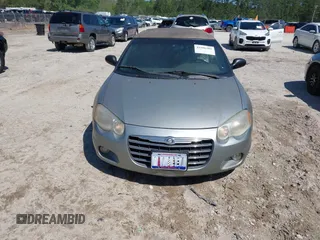2004 Chrysler Sebring Limited with VIN 1C3EL65R74N171865, listed as a IAAI auction lot 41996305 with 151,613 mi miles and . Bid and sale history available at DreamBid. Image 6.