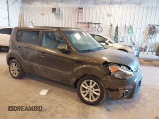 2012 Kia Soul + with VIN KNDJT2A64C7452975, listed as a IAAI auction lot 41635133 with 164,937 mi miles. Bid and sale history available at carsss.com. Image 1.