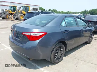 2014 Toyota Corolla L with VIN 2T1BURHEXEC150874, listed as a IAAI auction lot 42381275 with 183,022 mi miles and . Bid and sale history available at DreamBid. Image 4.