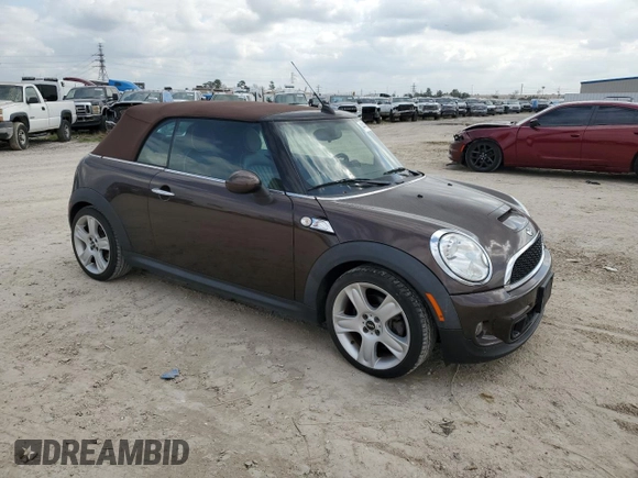2011 MINI Convertible S with VIN WMWZP3C58BTX83725, listed as a Copart auction lot 44418965 with 45,401 mi miles and Salvage title. Bid and sale history available at DreamBid. Image 4.