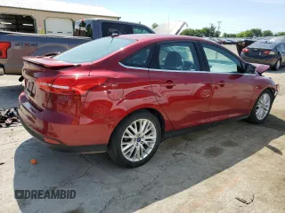 2017 Ford Focus Titanium with VIN 1FADP3J28HL209081, listed as a Copart auction lot 59171635 with 120,201 mi miles and Salvage title. Bid and sale history available at DreamBid. Image 3.