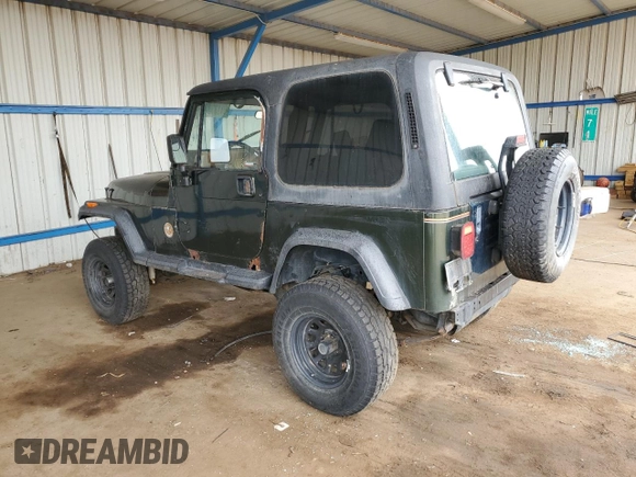 1995 Jeep Wrangler Sahara with VIN 1J4FY49S1SP256179, listed as a Copart auction lot 61137334 with 187,391 mi miles and Salvage Title. Bid and sale history available at carsss.com. Image 2.