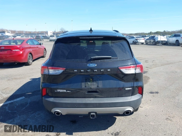 2020 Ford Escape Titanium z VIN 1FMCU9J98LUA44923, wystawiony jako IAAI lot #41779691 z przebiegiem 73 259 mil mil oraz . Historia ofert i sprzedaży dostępna na DreamBid. Obrazek 16.