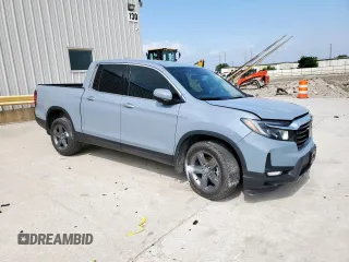 2023 Honda Ridgeline RTL-E with VIN 5FPYK3F76PB036572, listed as a Copart auction lot 54717085 with 34,516 mi miles and Salvage title. Bid and sale history available at DreamBid. Image 4.
