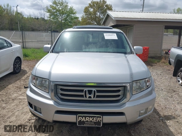 2014 Honda Ridgeline RTL with VIN 5FPYK1F53EB013752, listed as a IAAI auction lot 41886851 with 89,038 mi miles and . Bid and sale history available at DreamBid. Image 12.