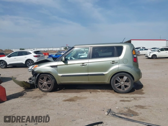 2011 Kia Soul + with VIN KNDJT2A28B7203204, listed as a IAAI auction lot 42028948 with 207,372 mi miles. Bid and sale history available at carsss.com. Image 14.