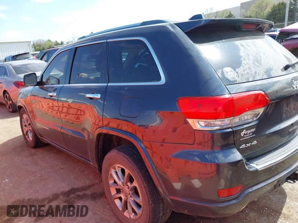2015 Jeep Grand Cherokee Overland with VIN 1C4RJFCG6FC831641, listed as a IAAI auction lot 41877680 with 143,568 mi miles. Bid and sale history available at carsss.com. Image 14.