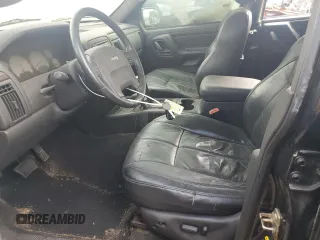 2004 Jeep Grand Cherokee Limited with VIN 1J8GW58J34C363977, listed as a Copart auction lot 61049485 with 162,329 mi miles and Salvage title. Bid and sale history available at DreamBid. Image 7.