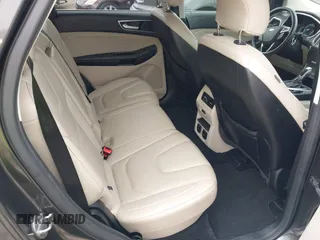 2015 Ford Edge Titanium z VIN 2FMTK3K81FBB88882, wystawiony jako IAAI lot #42184698 z przebiegiem 161 858 mil mil oraz . Historia ofert i sprzedaży dostępna na DreamBid. Obrazek 8.