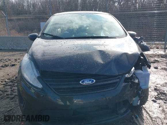 2013 Ford Fiesta S z VIN 3FADP4AJ2DM129703, wystawiony jako IAAI lot #41669041 z przebiegiem 138 831 mil mil oraz . Historia ofert i sprzedaży dostępna na DreamBid. Obrazek 12.
