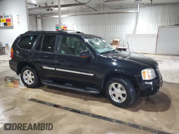 2003 GMC Envoy SLT with VIN 1GKDT13S232251871, listed as a Copart auction lot 45306785 with 174,303 mi miles and Salvage Title. Bid and sale history available at carsss.com. Image 4.