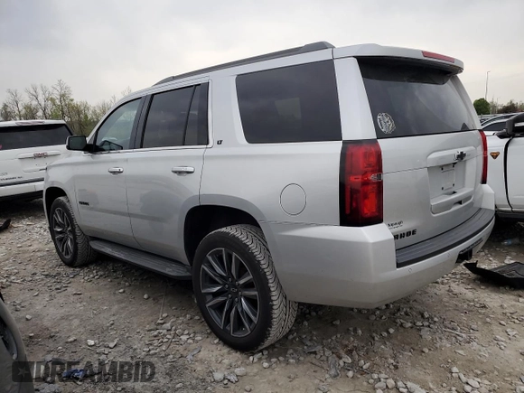 2016 Chevrolet Tahoe LT z VIN 1GNSKBKC4GR438992, wystawiony jako Copart lot #53170915 z przebiegiem 129 009 mil mil oraz Szkoda całkowita • Salvage title. Historia ofert i sprzedaży dostępna na DreamBid. Obrazek 2.