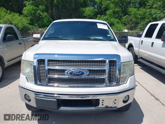 2011 Ford F-150 XLT with VIN 1FTFW1CT7BFA59275, listed as a IAAI auction lot 42111709 with 203,718 mi miles. Bid and sale history available at carsss.com. Image 12.