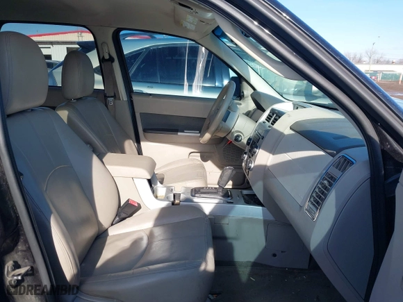 2011 Mercury Mariner Premier with VIN 4M2CN9HG1BKJ07239, listed as a IAAI auction lot 41487188 with 140,535 mi miles. Bid and sale history available at carsss.com. Image 5.