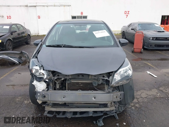 2015 Toyota Yaris L with VIN VNKKTUD38FA043393, listed as a IAAI auction lot 41573010 with 107,146 mi miles and . Bid and sale history available at DreamBid. Image 13.
