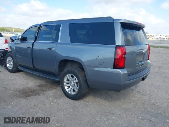 2020 Chevrolet Suburban LT z VIN 1GNSCHKC8LR157188, wystawiony jako IAAI lot #41578614 z przebiegiem 82 566 mil mil oraz . Historia ofert i sprzedaży dostępna na DreamBid. Obrazek 3.