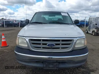 2000 Ford F-150 XL with VIN 1FTRX17W5YKB03384, listed as a IAAI auction lot 41723526 with 281,658 mi miles. Bid and sale history available at carsss.com. Image 6.