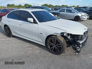 2022 BMW 3 Series 330e with VIN 3MW5P7J08N8C65252, listed as a IAAI auction lot 41229681 with 27,606 mi miles. Bid and sale history available at carsss.com. Image 1.
