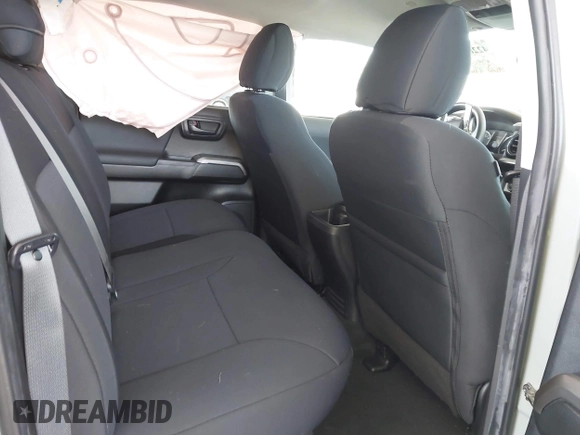 2022 Toyota Tacoma SR with VIN 3TMCZ5ANXNM479025, listed as a IAAI auction lot 42280363 with 29,650 mi miles and . Bid and sale history available at DreamBid. Image 8.