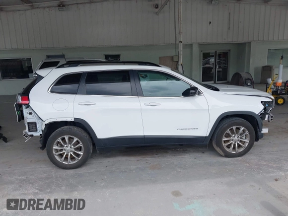 2022 Jeep Cherokee Latitude Lux z VIN 1C4PJLMXXND501689, wystawiony jako IAAI lot #42401720 z przebiegiem 34 037 mil mil oraz . Historia ofert i sprzedaży dostępna na DreamBid. Obrazek 14.