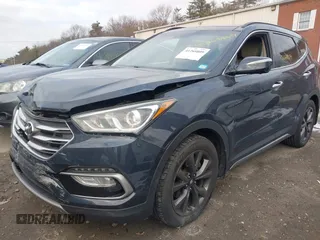 2017 Hyundai Santa Fe Ultimate with VIN 5NMZWDLA0HH045078, listed as a IAAI auction lot 41268809 with 100,659 mi miles and . Bid and sale history available at DreamBid. Image 2.