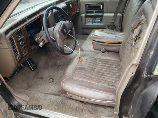 1991 Cadillac Brougham z VIN 1G6DW54EXMR701457, wystawiony jako Copart lot #70194104 z przebiegiem Nie podano mil oraz Nie do naprawy. Historia ofert i sprzedaży dostępna na DreamBid. Obrazek 7.