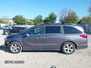 2020 Honda Odyssey EX with VIN 5FNRL6H54LB052660, listed as a IAAI auction lot 42051157 with 51,159 mi miles and . Bid and sale history available at DreamBid. Image 14.